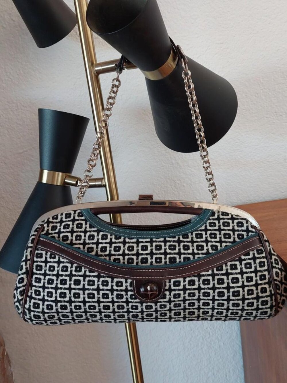 Y2K Apt. 9 brown and teal geometric-patterned fabric clutch featuring a metal ch